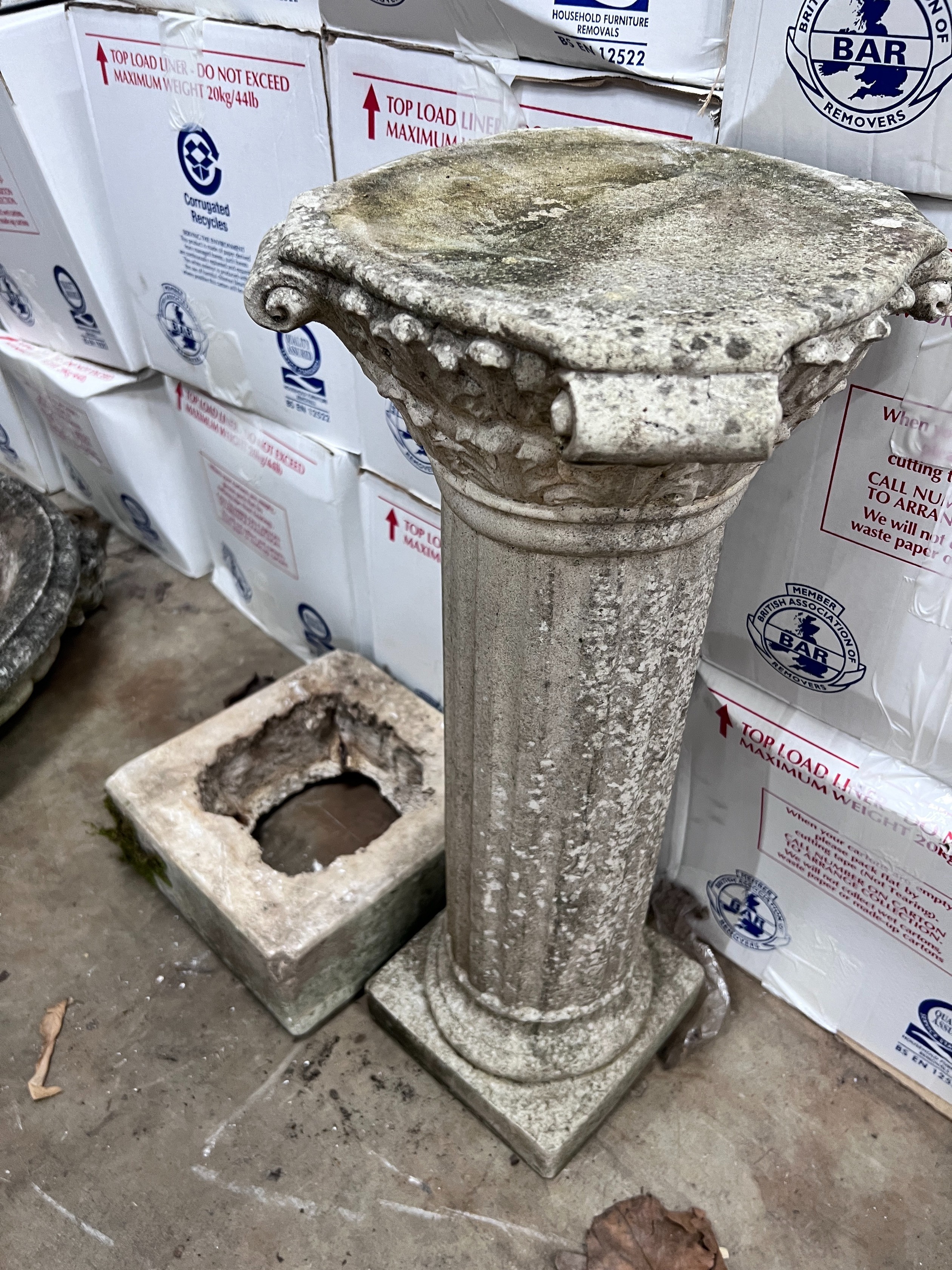 A reconstituted stone garden fountain with associated pedestal, width 76cm *Please note the sale commences at 9am.